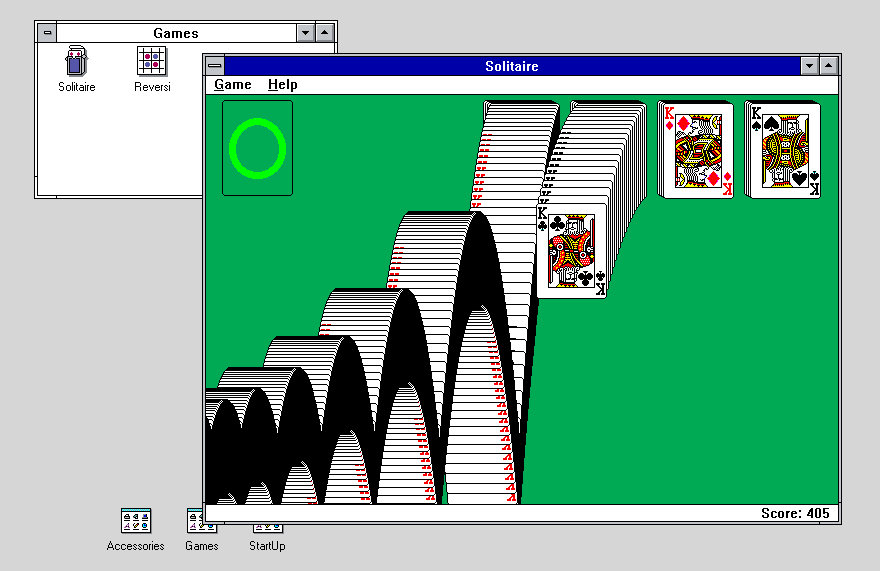 End screen of Klondike Solitaire with cascading cards on a classic Windows 3.0 desktop interface